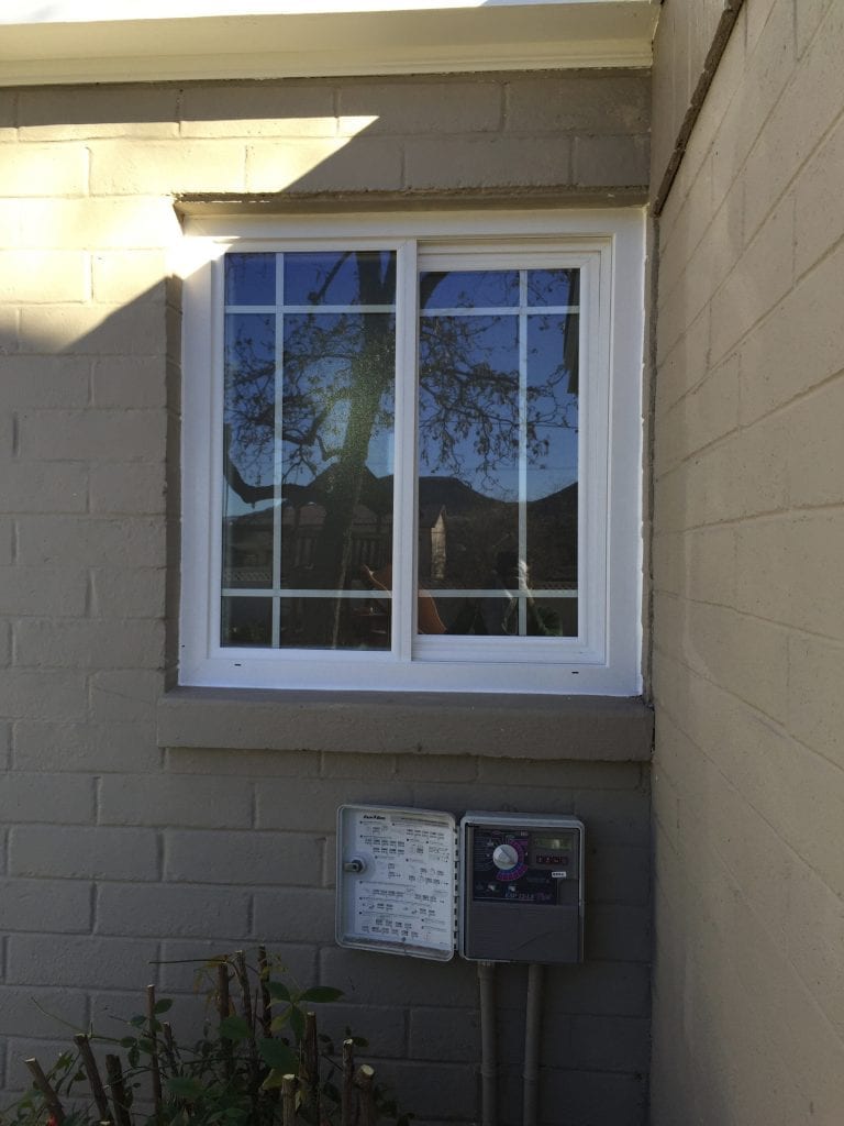 new window on old brick home